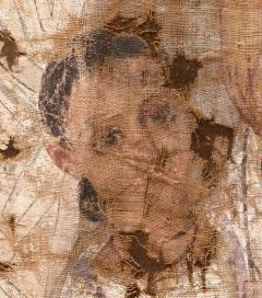 Detail of the shroud with the face of the child